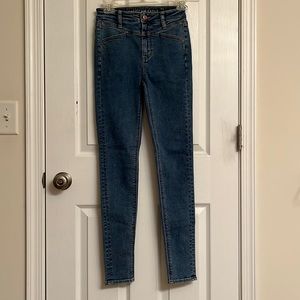 American Eagle Next Level Stretch Med Blue Skinny Jeans Slant Pockets Size 2